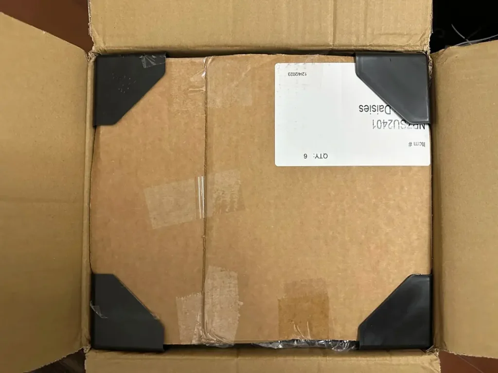 Aftermarket projector headlights securely packed in carton boxes with corner protection for export