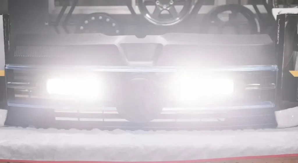 Removed grille test with harsh white car grill lights turned on to check glare.