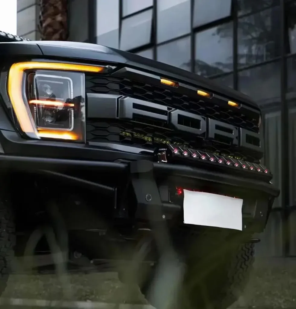 Close-up of LED grill lights modules mounted behind the grille, showing the grille pattern and how the lights sit within the openings.