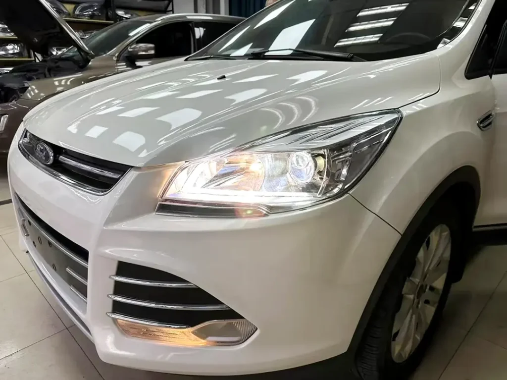 Ford EcoSport with factory projector headlights installed