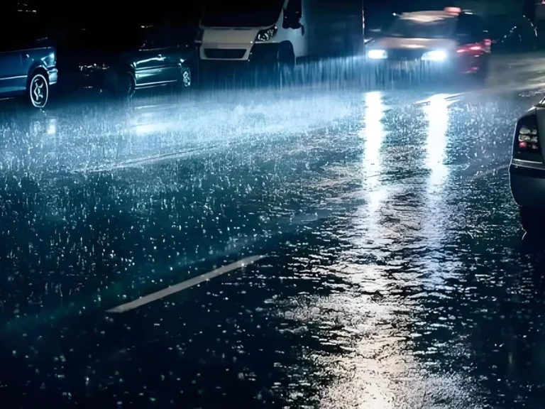 Baleno Fog Light beam pattern on a rainy night, low and wide light spread on the road