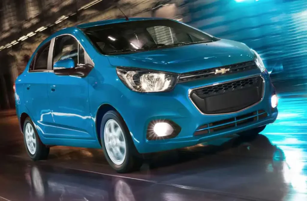 beat fog light on a Chevrolet Beat driving on the road with headlights and fog lamps turned on