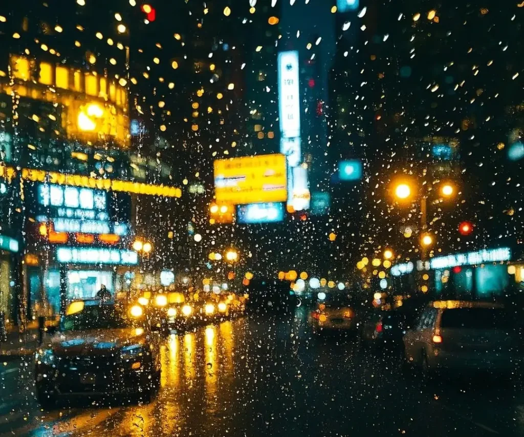 Best fog light color for rain: fog lights on a rainy night highlighting glare and reflections on a wet road