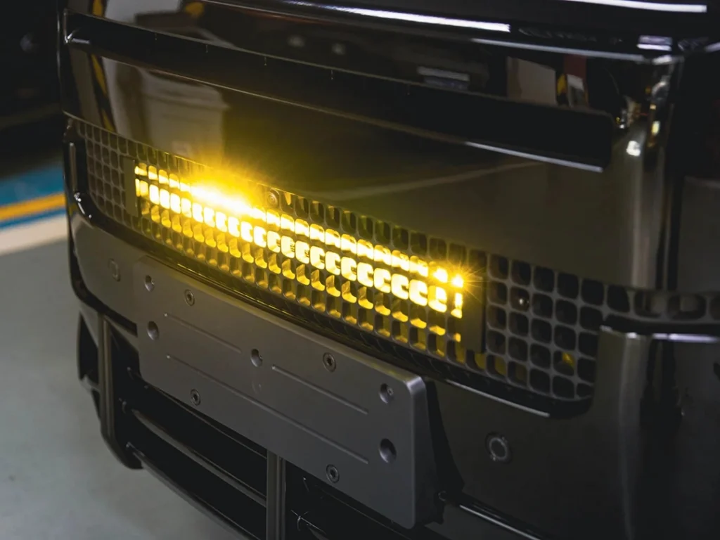 Grill lamp close-up on a car grille with integrated fog light