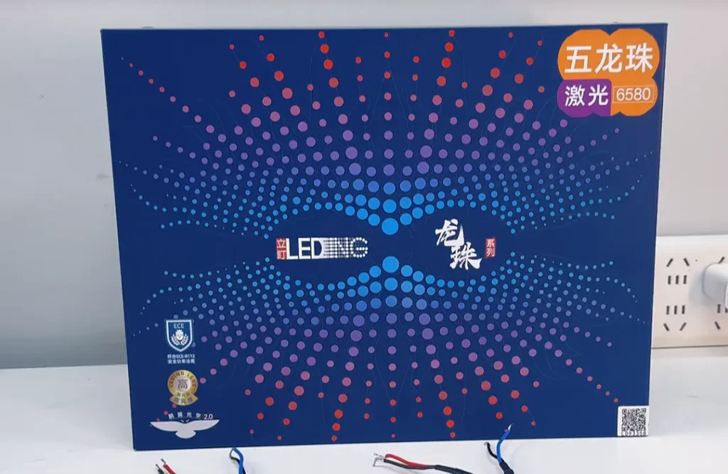 Rigid box packaging for a projector headlight, used for protection and shipping, shown as the product’s hard carton.